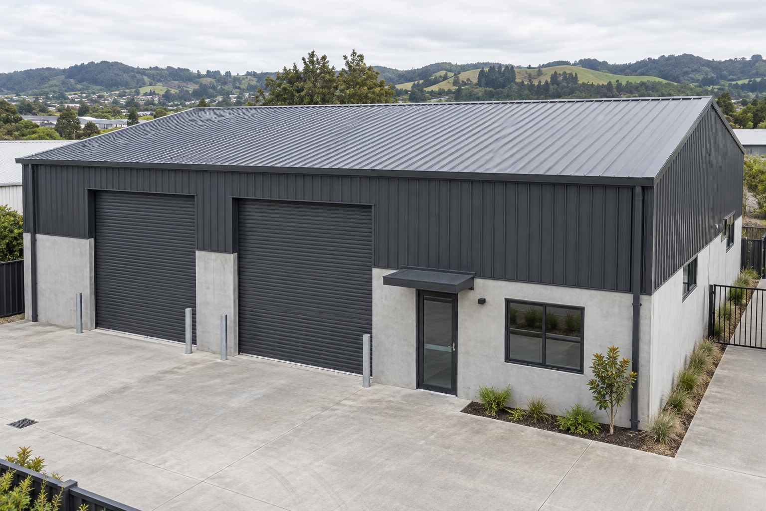 A fictional light-industrial building with metal roof and clear forecourt